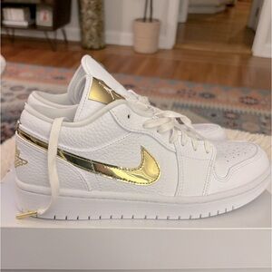 Brand new, never worn women’s Jordan 1 Low (white + metallic gold) Size 8.5, 9.5